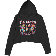 Women's cropped fleece hoodie with drippy chocolate-style "SIX SEVEN" text and frosted 6 and 7 donut characters with sprinkles