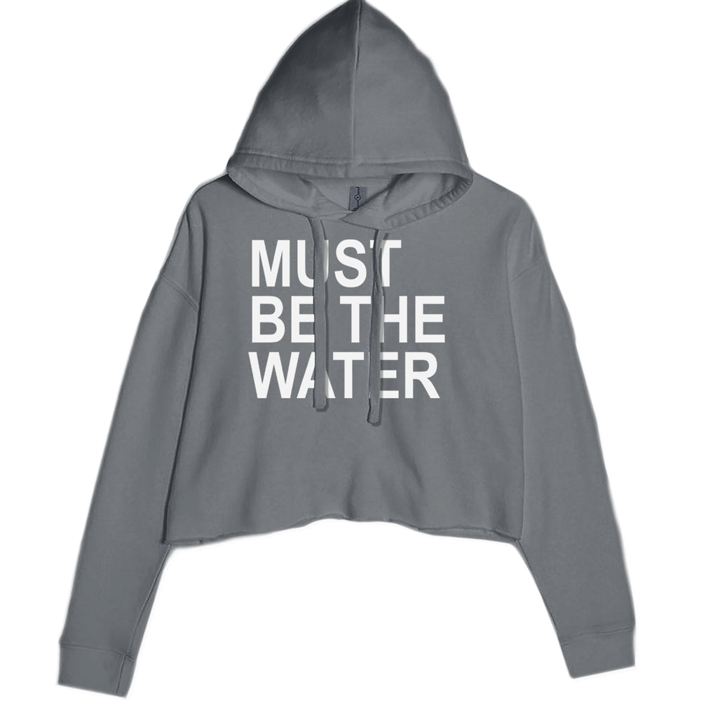 Must Be The Water Funny Racing Meme graphic on Women's Cropped Fleece Hoodie in Charcoal Grey