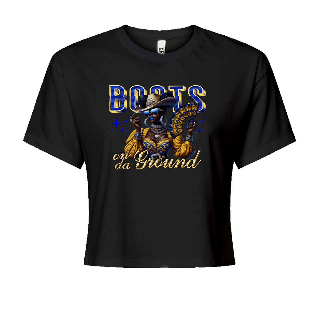 Blinged-out cowgirl with shades and folding fan "Boots on da Ground" graphic on a women's boxy crop t-shirt