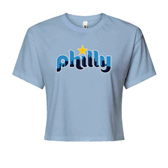 Vintage light blue "philly" lettering with Philadelphia skyline inside and yellow star detail on a Women's Boxy Crop T-Shirt