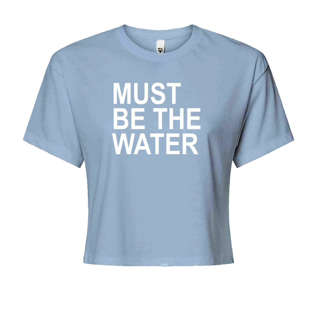Must Be The Water Funny Racing Meme Cropped T-Shirt Light Blue