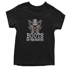 Kids' Heavyweight Cotton T-Shirt with rhinestone-style cowgirl hat, iced-out hands, drippy jewelry details, and bold boots on the ground text