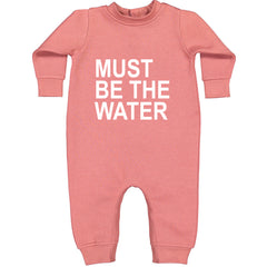 Must Be The Water Funny Racing Meme Toddler Hoodie Or Infant Fleece Romper Mauve