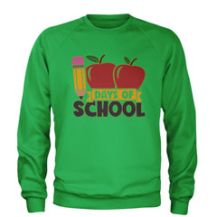 Pencil and two apples "100 Days of School" graphic on a unisex heavyweight fleece crewneck sweatshirt