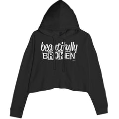 Women's cropped fleece hoodie with bright tie-dye style burst and "beautifully broken" text on front