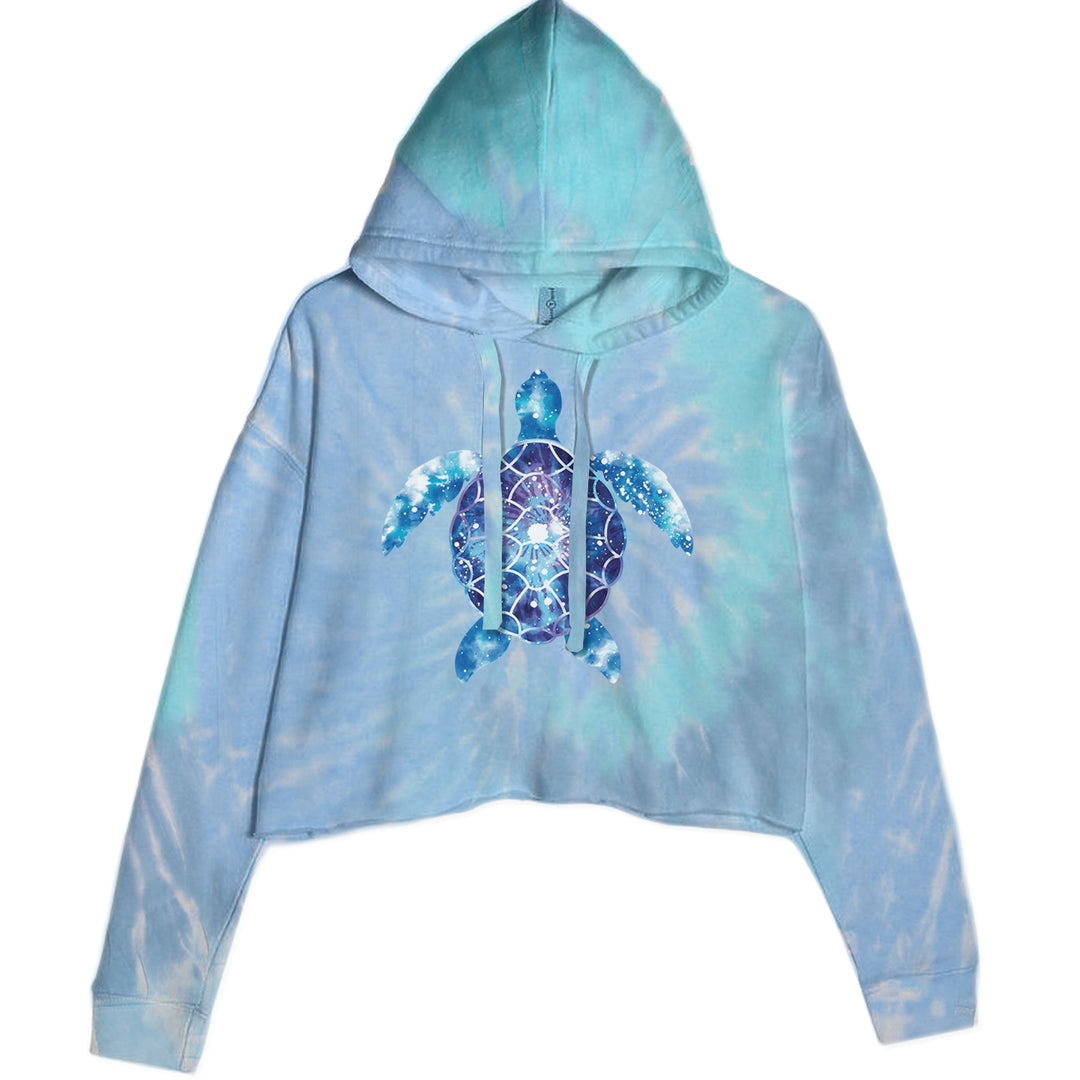 Blue and purple tie-dye sea turtle silhouette graphic on a Women's Cropped Fleece Hoodie with raw-edge hem