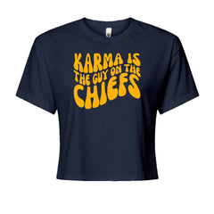 Chunky wavy yellow lettering on red football-humor graphic on a Women's Boxy Crop T-Shirt