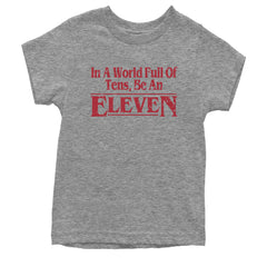 In A World Full Of Tens, Be An Eleven Youth T-shirt Heather Grey