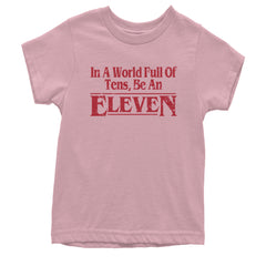 In A World Full Of Tens, Be An Eleven Youth T-shirt Light Pink