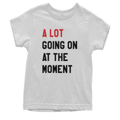 Kids' Heavyweight Cotton T-Shirt with stacked bold text reading "A LOT GOING ON AT THE MOMENT" in red and black