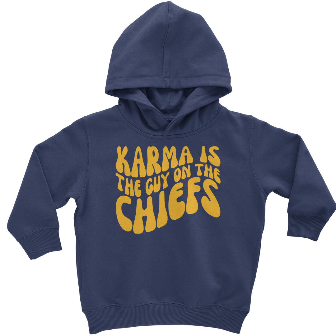 Wavy yellow text on red reading "KARMA IS THE GUY ON THE CHIEFS" on a toddler pullover fleece hoodie and infant footless fleece one-piece