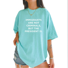 Immigrants Are Not Criminals Vintage Soft Unisex T-shirt Chalky Mint