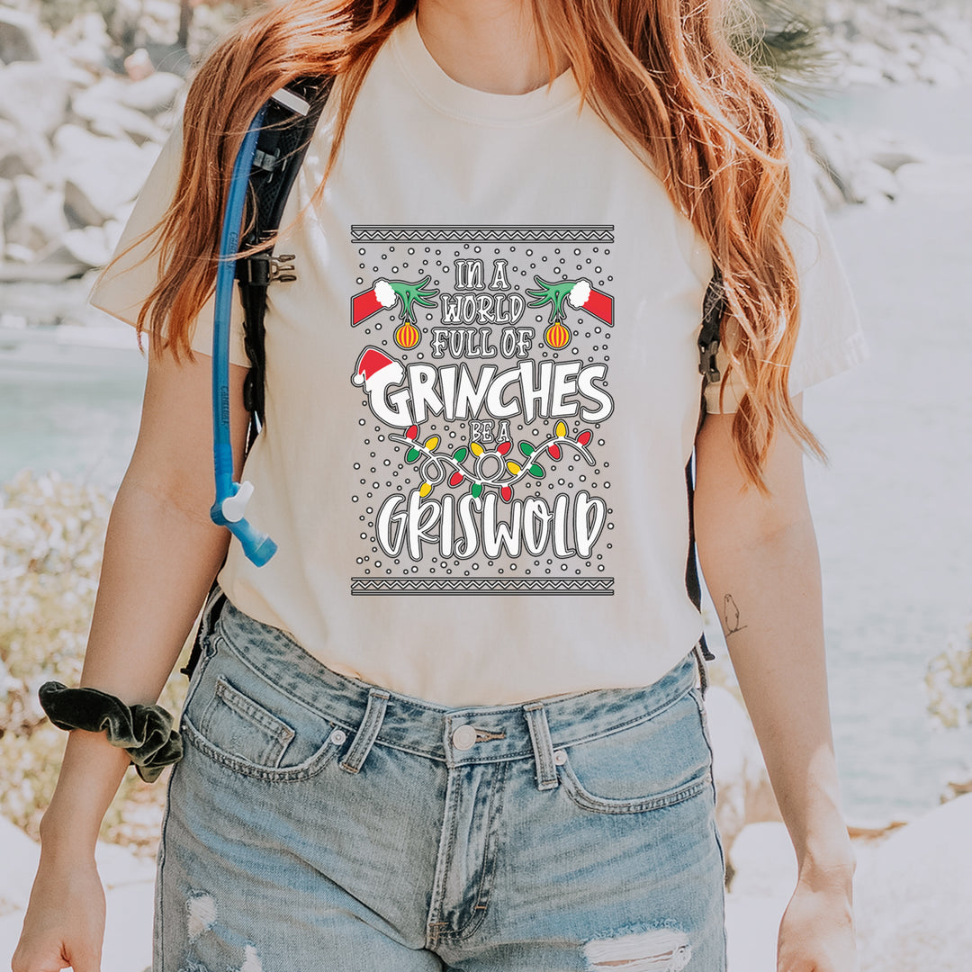 In A World Full Of Grinches, Be A Griswold Vintage Soft Unisex T-shirt 