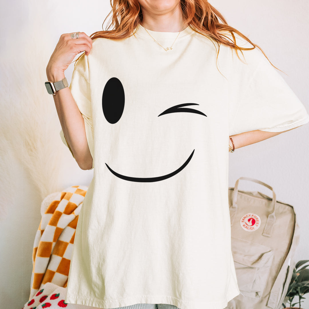 Emoticon Winking Smile Face graphic on Garment-Dyed Heavyweight Unisex T-Shirt in Ivory