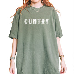 Cuntry Been Country Cowboy graphic on Garment-Dyed Heavyweight Unisex T-Shirt in Moss