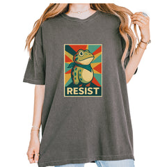 Protest frog poster-style artwork with the word "RESIST" on a Comfort Colors 1717 garment-dyed heavyweight unisex T-shirt