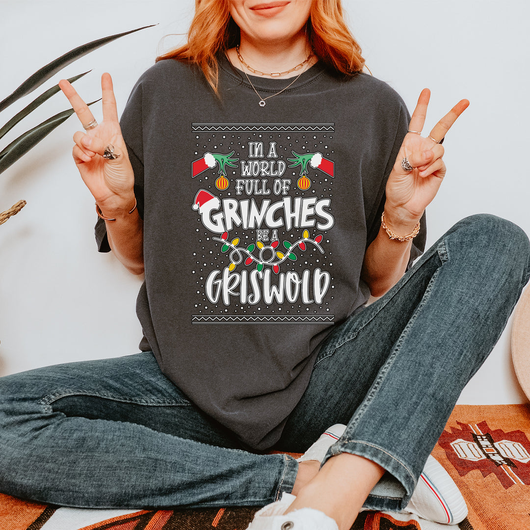 In A World Full Of Grinches, Be A Griswold Vintage Soft Unisex T-shirt 