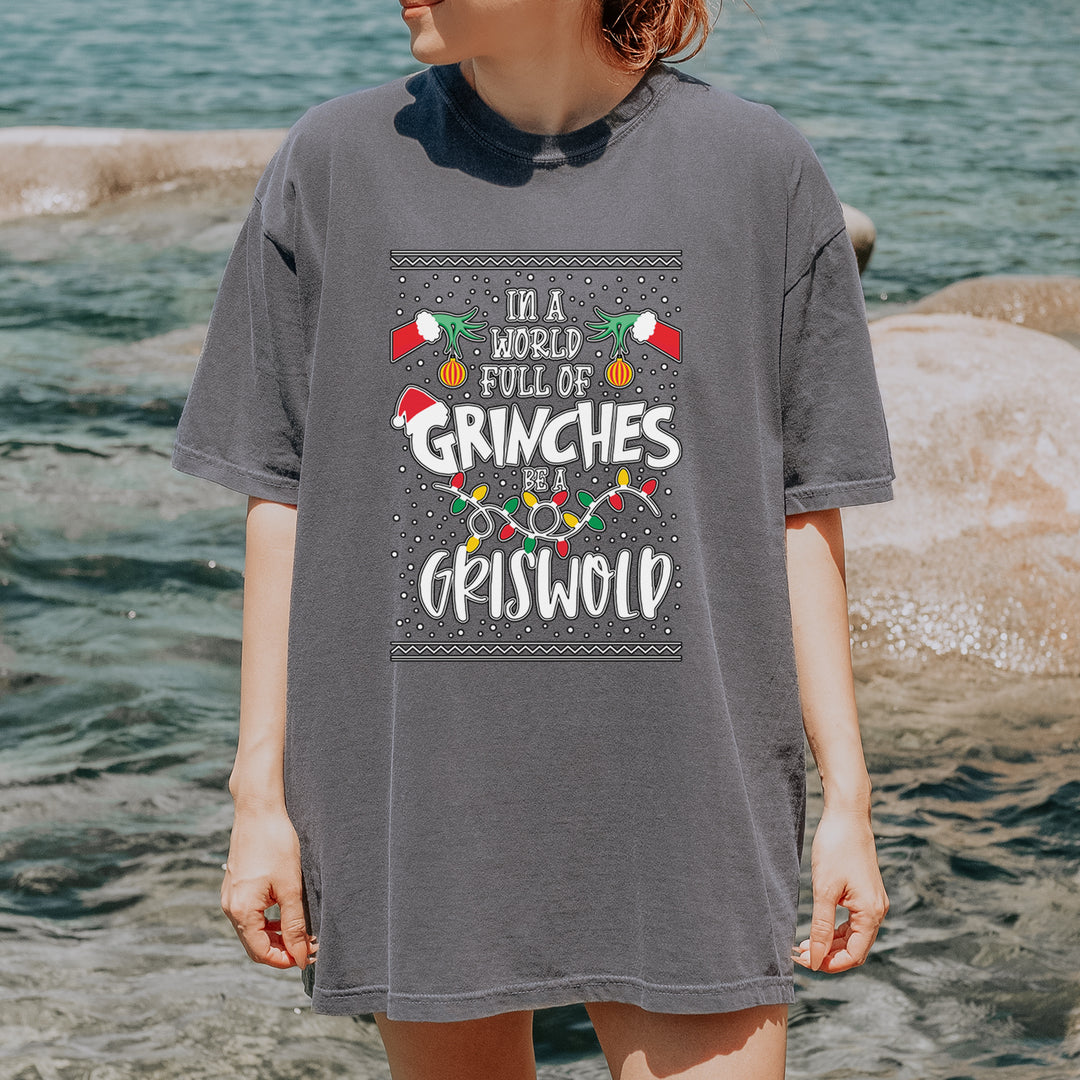 In A World Full Of Grinches, Be A Griswold Vintage Soft Unisex T-shirt 