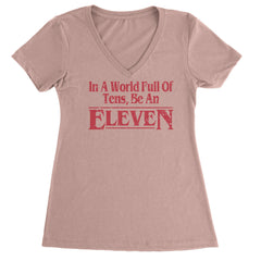 In A World Full Of Tens, Be An Eleven Ladies V-Neck T-shirt Light Pink