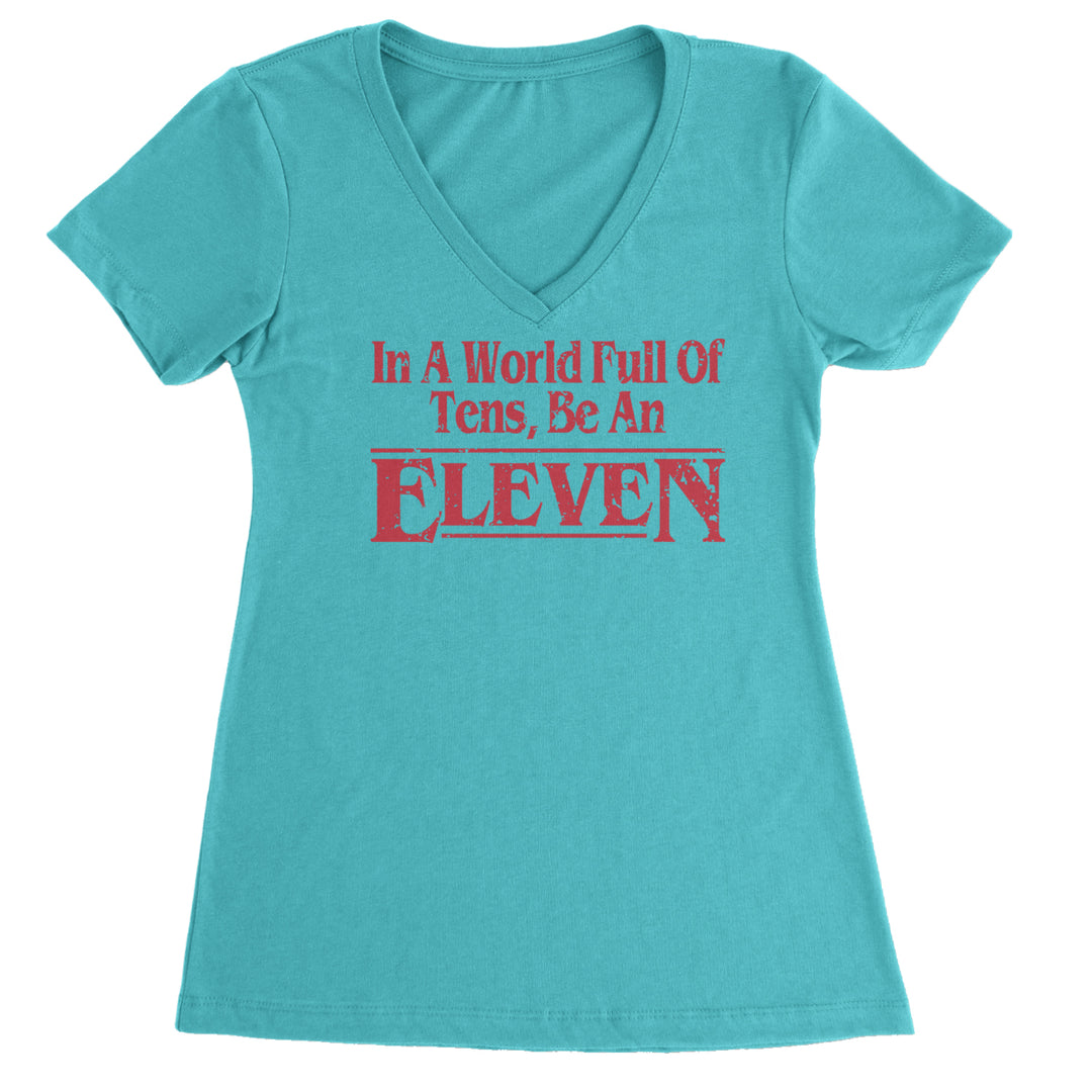 In A World Full Of Tens, Be An Eleven Ladies V-Neck T-shirt Surf