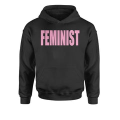 Kids' heavyweight fleece pullover hoodie with bright pink block text reading "FEMINIST" on the front