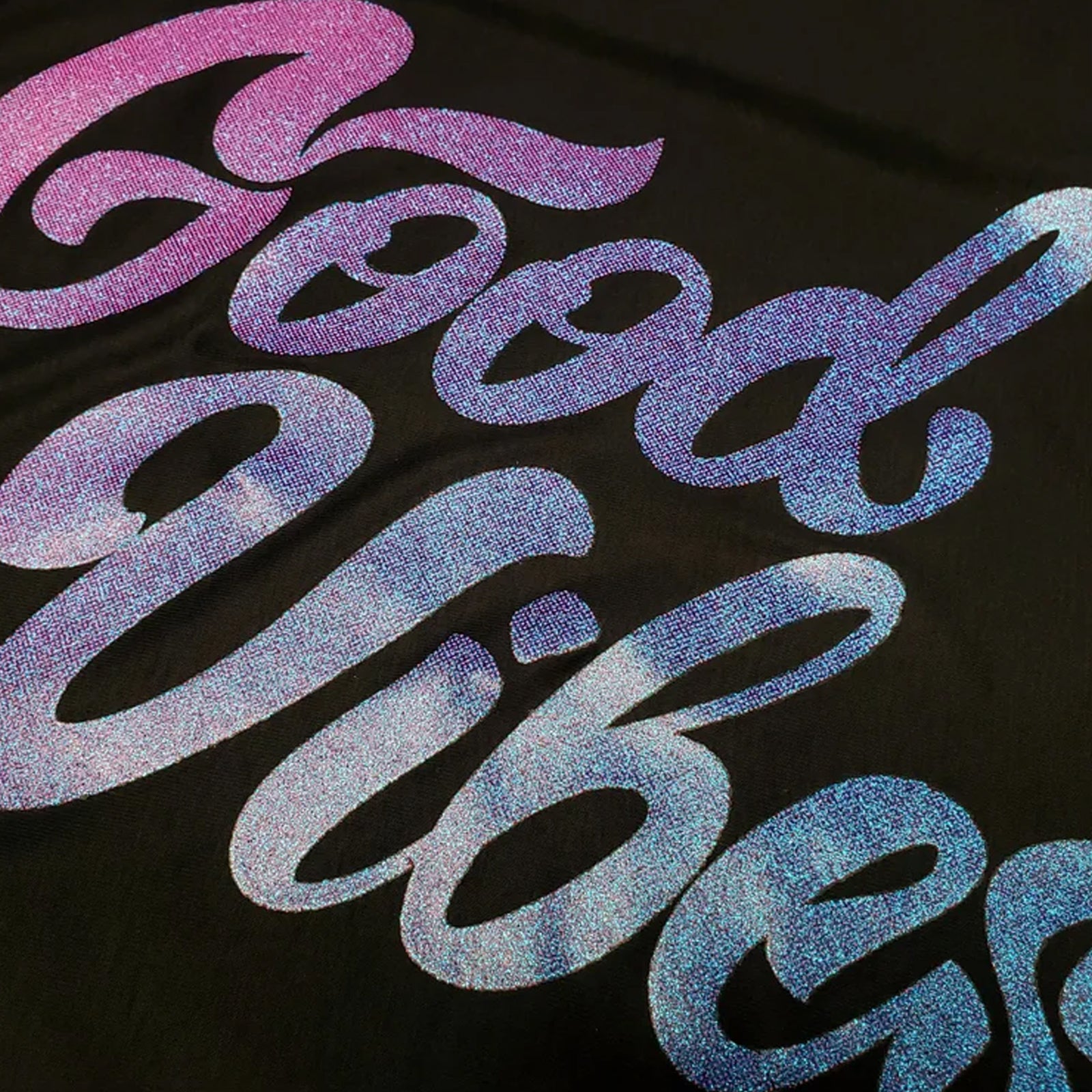 Close-up example of Glitter custom apparel printing