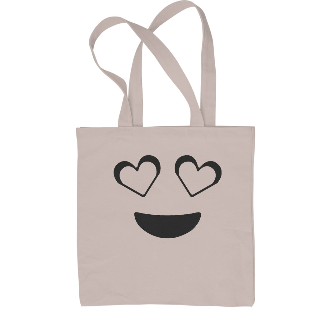 Heart-eyes smiley face graphic on a Classic Cotton Canvas Tote, flat 15 by 16 inch cotton canvas with web handles